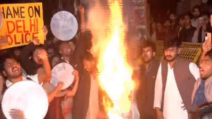 Effigy of the JNU VC burnt during protest (Photo/ANI)