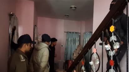 Handwara police officers conducting raids (Photo/ANI)