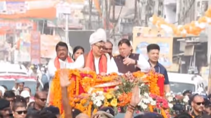 Uttarakhand CM Pushkar Singh Dhami with Union Minister Kiren Rijiju and Jual Oram (Photo/ANI)