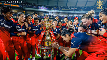 RCB team with the trophy. (Photo: @RCBTweets X)