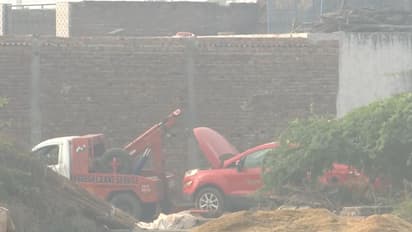 Police teams tow the suspect Ford car away (Photo/ANI)