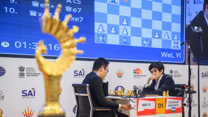GM Wei Yi and GM Javokhir Sindarov (Photo: FIDE)
