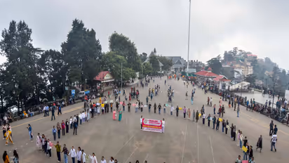 Students make a human chain during awareness rally on World Breastfeeding Day, at Ridge in Shimla in 2023. (Photo/ANI)