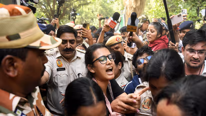 All India Students' Association (AISA) National President Neha Bora during a protest against Chief Election Commissioner Gyanesh Kumar (Photo/ANI)