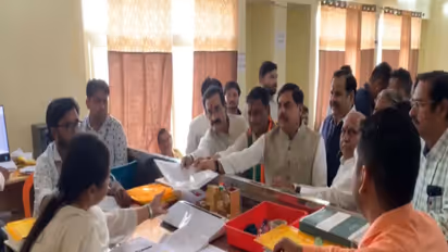BJP candidate Ashutosh Tiwari accompanied with CM Mohan Yadav and senior BJP leader Narottam Mishra (Photo/ANI)