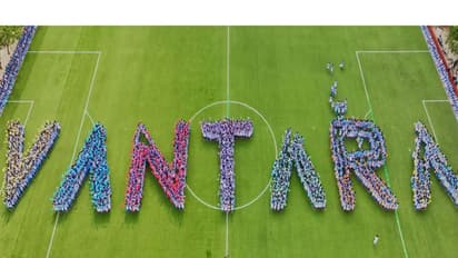 KISS students form Vantara logo to thank Anant Ambani (Photo/KISS Foundation)