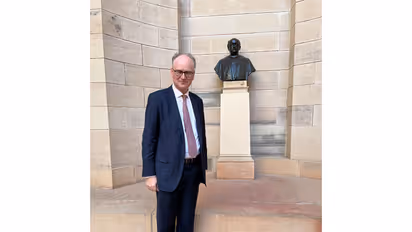 Matt Riddley in front of bust of Edwin Lutyens (Photo/X@mattwridley)