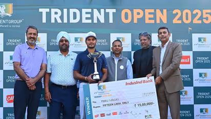 Manu Gandas lifting Trident Open 2025 trophy (Image: PGTI)