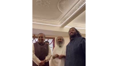 Chairman & Managing Director of Reliance Industries Limited Mukesh Ambani and his son Anant Ambani with spiritual leader Sri Sri Ravi Shankar (Photo: Art of Living Foundation)