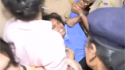 Mumbai Police detain protesters (Photo/ANI)