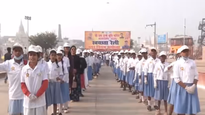 Children of Ayodhya during the cleanliness drive organised by municipal corporation ahead of 'Dhawjarohan' programme. (Photo/ANI)