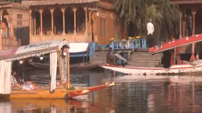 Tourists enjoy Shikara rides in Srinagar (Photo/ANI)
