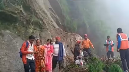 Pilgrims and rescue personnel at the landslide-hit Kedarnath trekking route near Chhaudi (Photo/ANI)