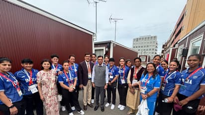 Mansukh Mandaviya with the Indian athletes in Nagoya (Photo: Union Minister for Youth Affairs and Sports)
