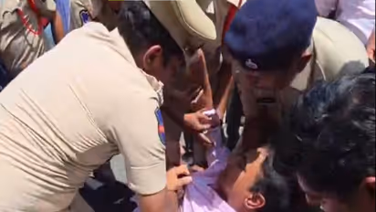 BRS leader (Pink Shirt) detained by Police (Photo: BRS Office)