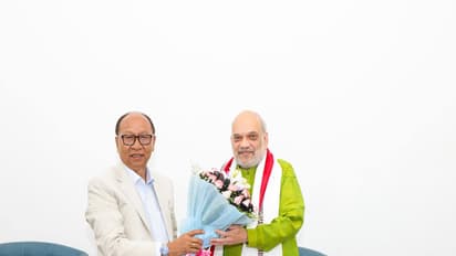 Manipur CM Yumnam Khemchand Singh with Union Minister Amit Shah (Photo/@YKhemchandSingh)