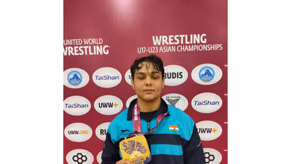 Mansi Lather posing with gold at U23 Asian Wrestling Championships in Vietnam (Image: WFI media)
