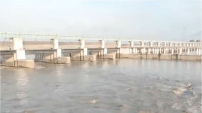 Visuals of the Gandak River at the Valmikinagar Barrage where the water level currently stands at 1,14,000 cusecs (Photo/ANI)