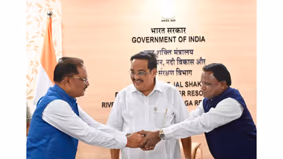 Union Minister of Jal Shakti CR Patil with Vishnu Deo Sai and Mohan Charan Majhi (Photo/ANI)