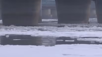 A thick layer of toxic foam seen floating on the surface of the Yamuna River near the Kalindi Kunj (Photo/ANI)
