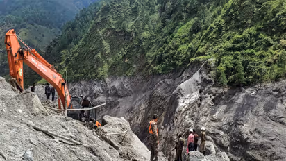 A joint team of India and Nepal works to construct the road towards the flood-hit hydropower tunnel as part of rescue operations, at Chilime in Rasuwa (File Photo/ANI)