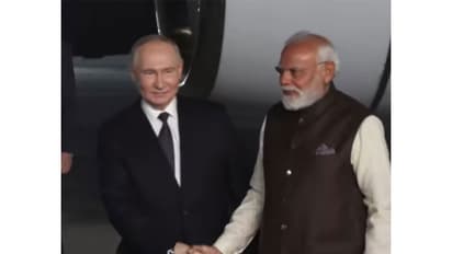 PM Modi receives Russian President Vladimir Putin as he lands in Delhi (Photo/ANI)
