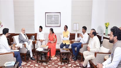 Andhra Ministers, Nara Lokesh and Vangalapudi Anitha with Union Minister Amit Shah. (Photo/ANI)