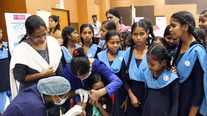 A health worker inoculates the HPV vaccines to a school girl during a free HPV vaccination camp (Photo/ANI)