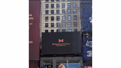 Mobavenue AI's new brand identity displayed at Times Square with Eric Lind, Country Head (Photo/Mobavenue AI)