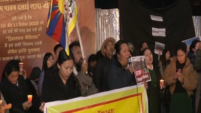 Tibetans hold candle-light vigil (Photo/ANI)