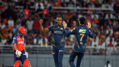 Gujarat Titans' Kagiso Rabada and skipper Shubhman Gill. (Photo/ANI)