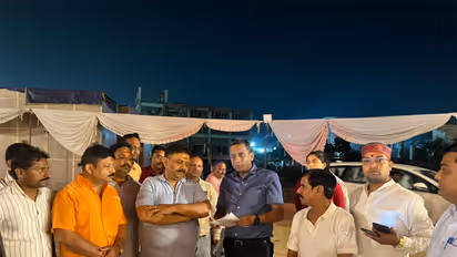 Uttar Pardesh Minister Ravindra Jaiswal reviews preparations for CM Yogi Adityanath's rally in Varansi (Photo/ANI)