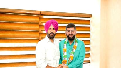 Advocate Vasu Ranjan with Punjab President Raja Warring (Photo/ANI)