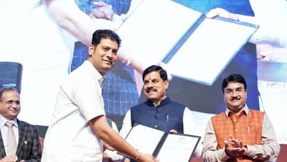 MP CM Mohan Yadav distributing appointment letters to new recruits (Photo / X @DrMohanYadav51)