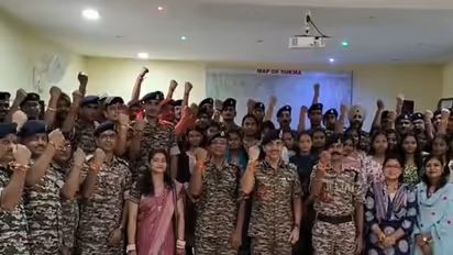 Students and teachers tie rakhis to CRPF jawans in Chhattisgarh's Sukma (Photo/ANI)
