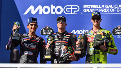 MotoGP racers podium celebration (Photo: MotoGP)