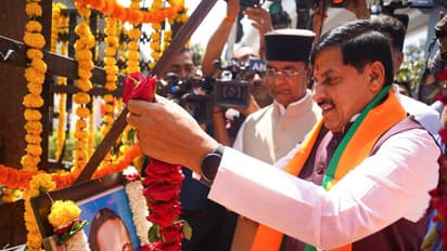 MP CM Mohan Yadav is paying floral tribute to Dr BR Ambedkar (Photo / X @CMMadhyaPradesh)
