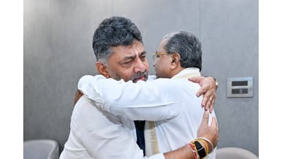 Karnataka Chief Minister Siddaramaiah and Deputy Chief Minister DK Shivakumar hug each other (Photo/X/INCKarnataka)