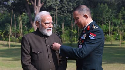 Prime Minister Narendra Modi along with a security official (Photo/X@narendramodi)