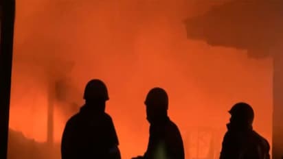 Firefighters attempt to douse the blaze at the factory in Hapur (Photo/ANI)