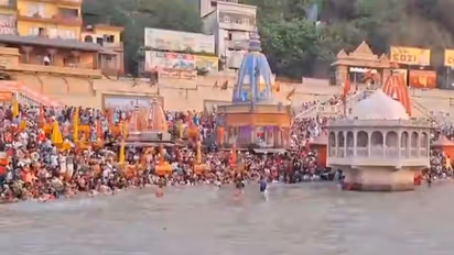 Devotees gathered on banks of Ganga (Photo/ANI)