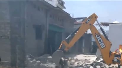 Demolition underway at the residence of an accused in Bairagiwala communal violence case in Sahaspur, Dehradun (Photo/ANI)