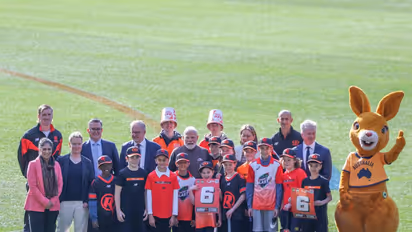 Prime Minister Narendra Modi and Australian Prime Minister Anthony Albanese pose for a group photograph with young cricketers during their visit to the Melbourne Cricket Ground (MCG) (Photo: X/@MEAIndia)