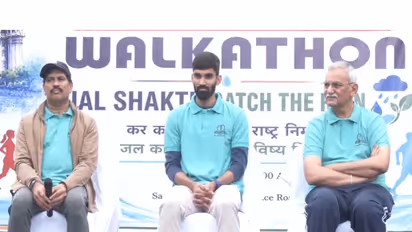Suresh Battini, Kidambi Srikanth and KV Chowdary during Income Tax Department's Walkathon in Hyderabad. (Photo: ANI)