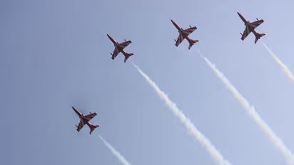 IAF Surya Kiran team performs synchronized aerobatics at ‘Wings Over Ganges’ air show (Photo/ANI)