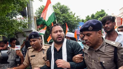 Police detain Bihar Assembly LoP and RJD leader Tejashwi Yadav during a foot march towards Lok Bhawan (Photo/ANI)