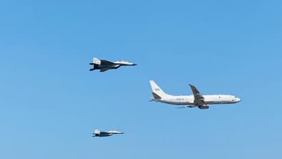 Indian Navy P-8I Poseidon aircraft in formation with MiG-29K fighter jets (File Photo/ PIB)