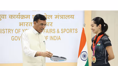 Union Sports Minister Mansukh Mandaviya with Anahat Singh. (Photo: ANI)