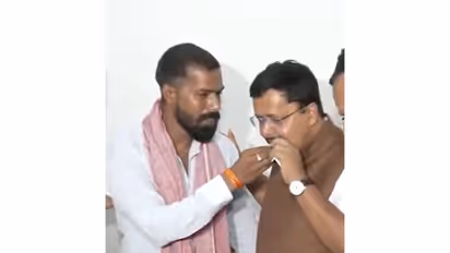 BJP National President Nitin Nabin met booth president Shivaji Rawat in Lucknow, (Photo/ANI)