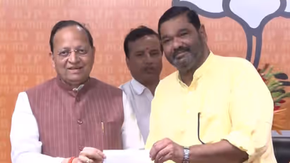 MP Debashish Samantaray (R) joins BJP (Photo/ANI)
